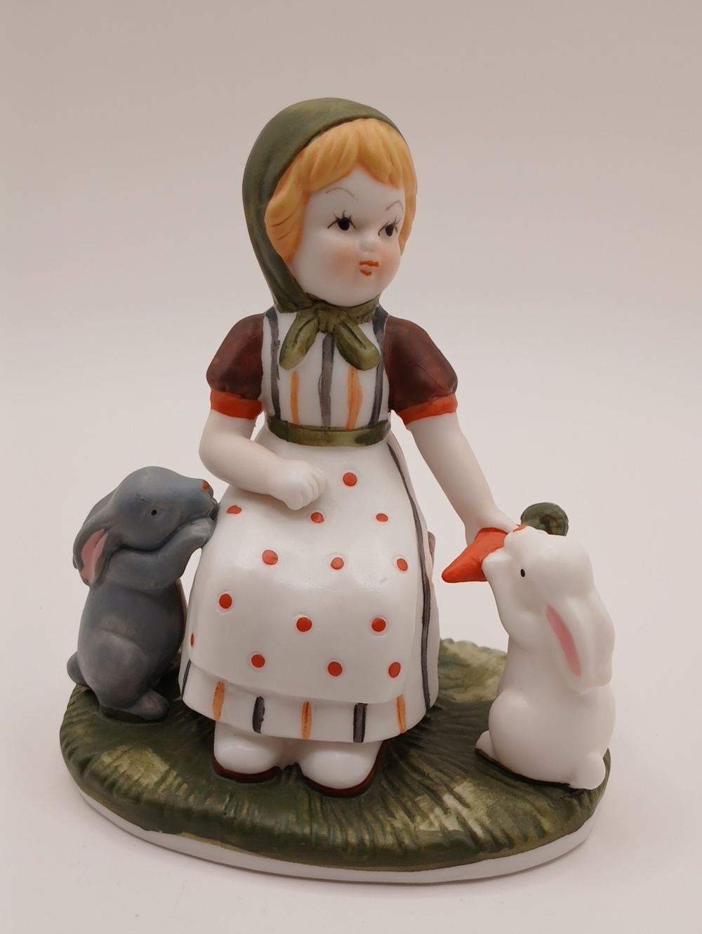 Ceramic Girl Figurine with Rabbits